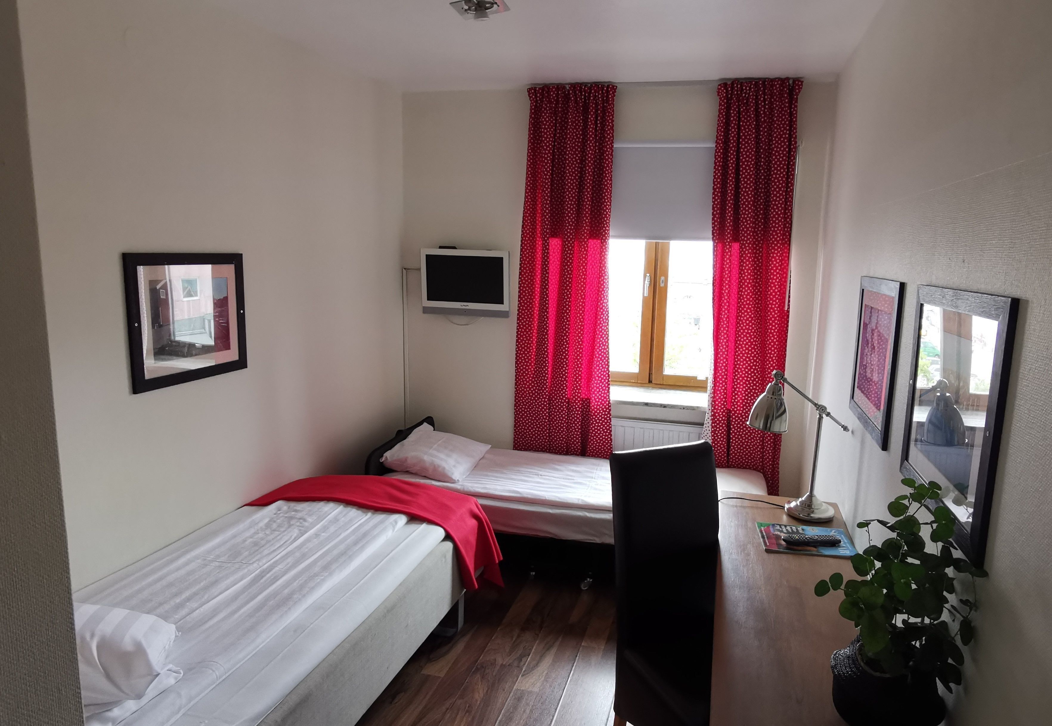 Desk, blackout curtains, free WiFi, bed sheets