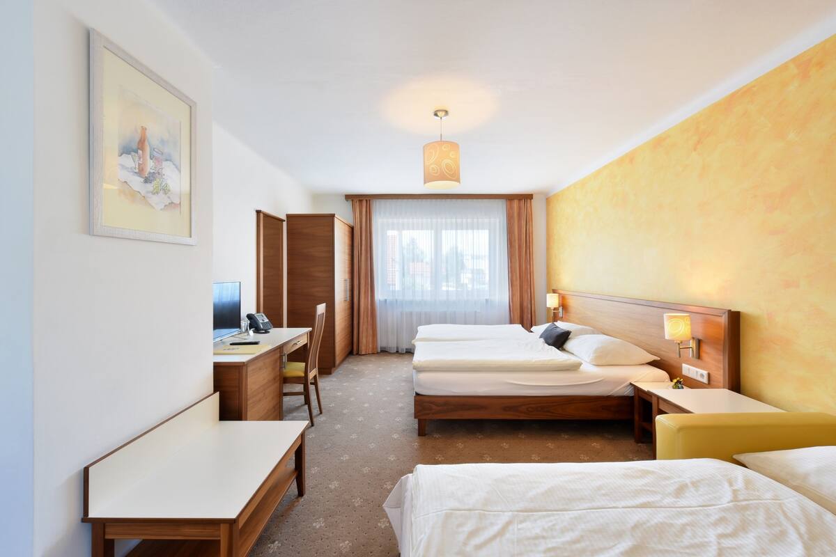 Triple Room | Pillow-top beds, minibar, in-room safe, desk