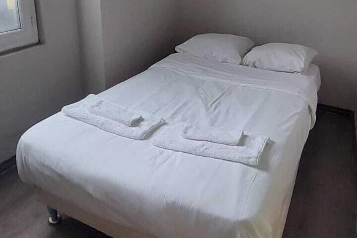Desk, free WiFi, bed sheets