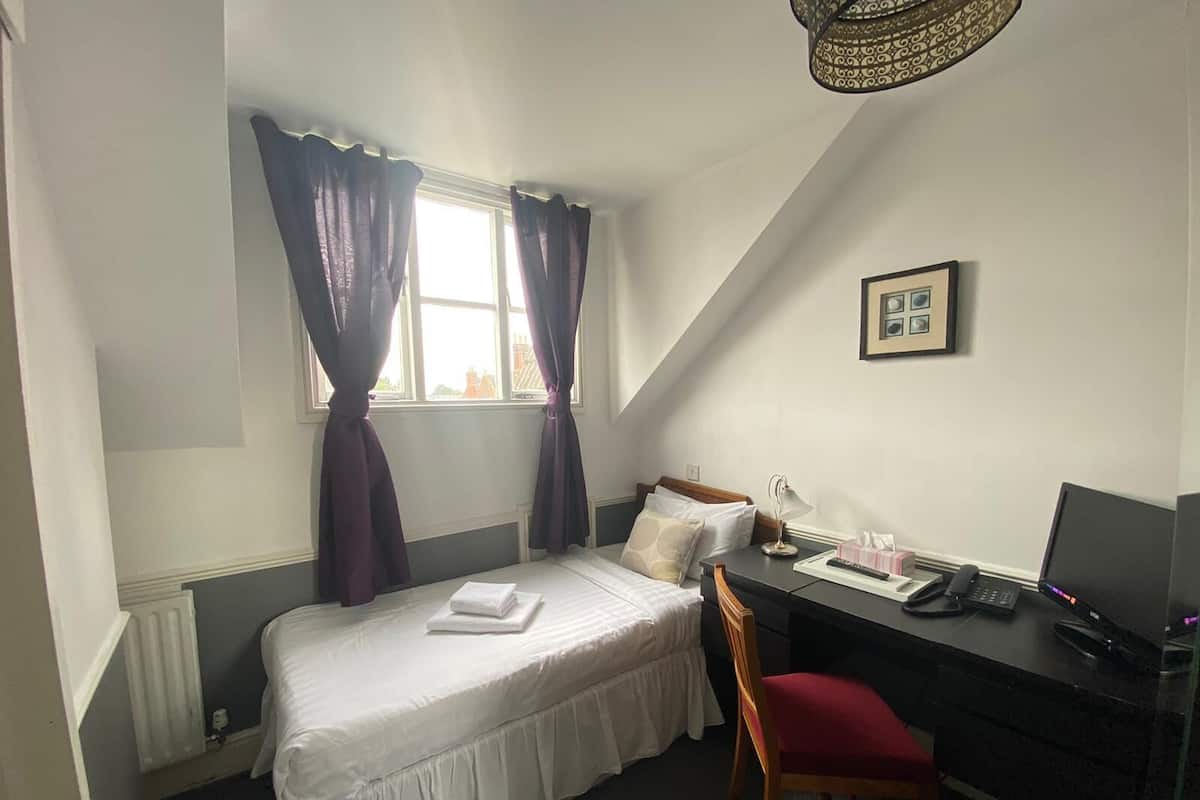 Economy Single Room | Iron/ironing board, WiFi (free), bed sheets