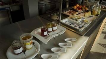 Daily buffet breakfast (CHF 18 per person)