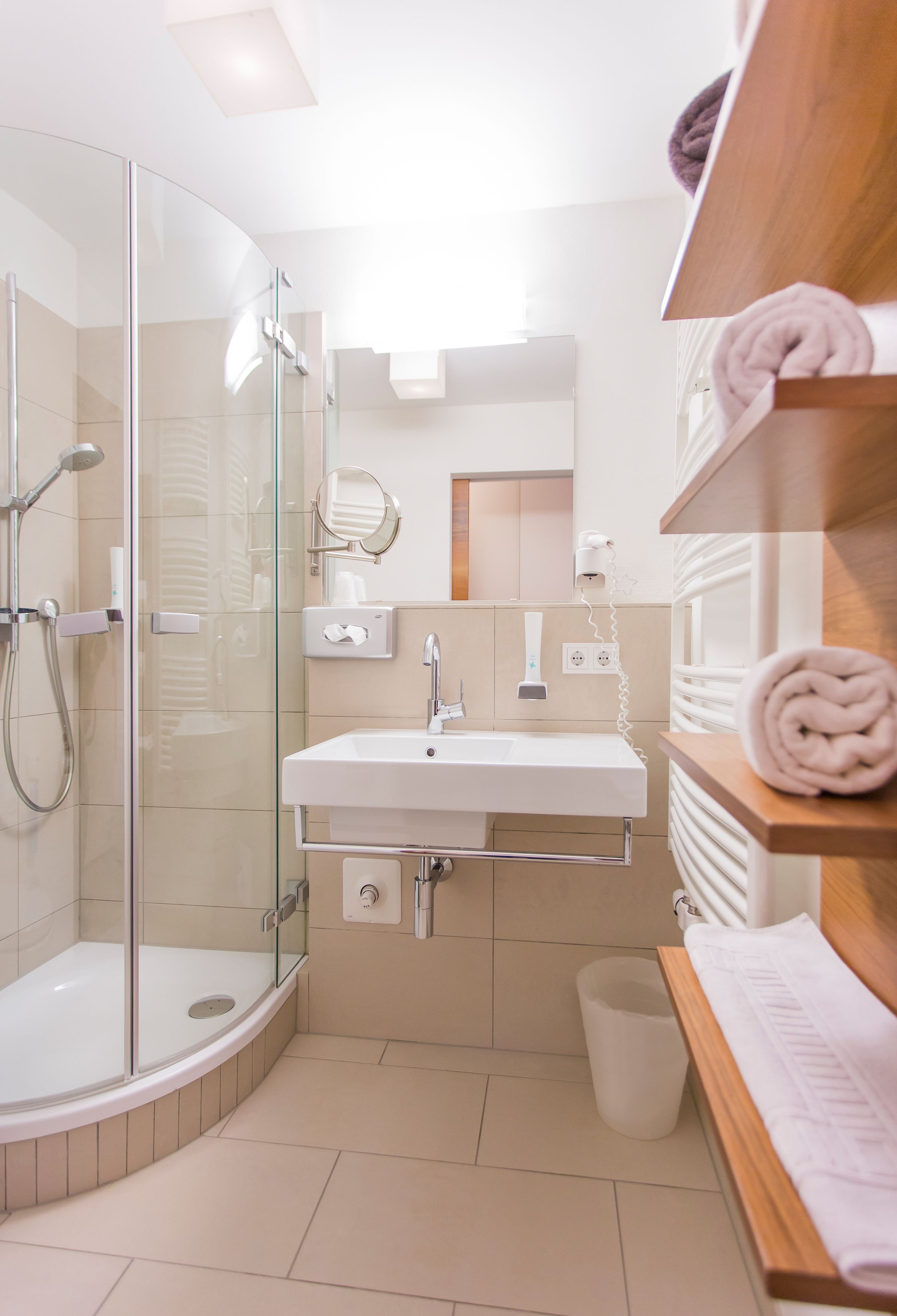 separate bathtub and shower, free toiletries, hair dryer, slippers