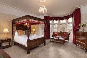 Four Poster Suite | Living area | 32-inch flat-screen TV with digital channels, TV