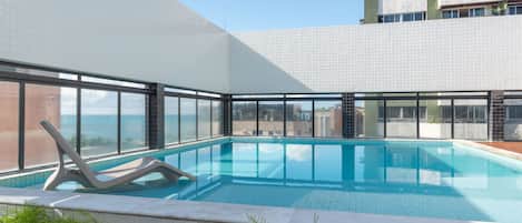 Outdoor pool, pool umbrellas, pool loungers