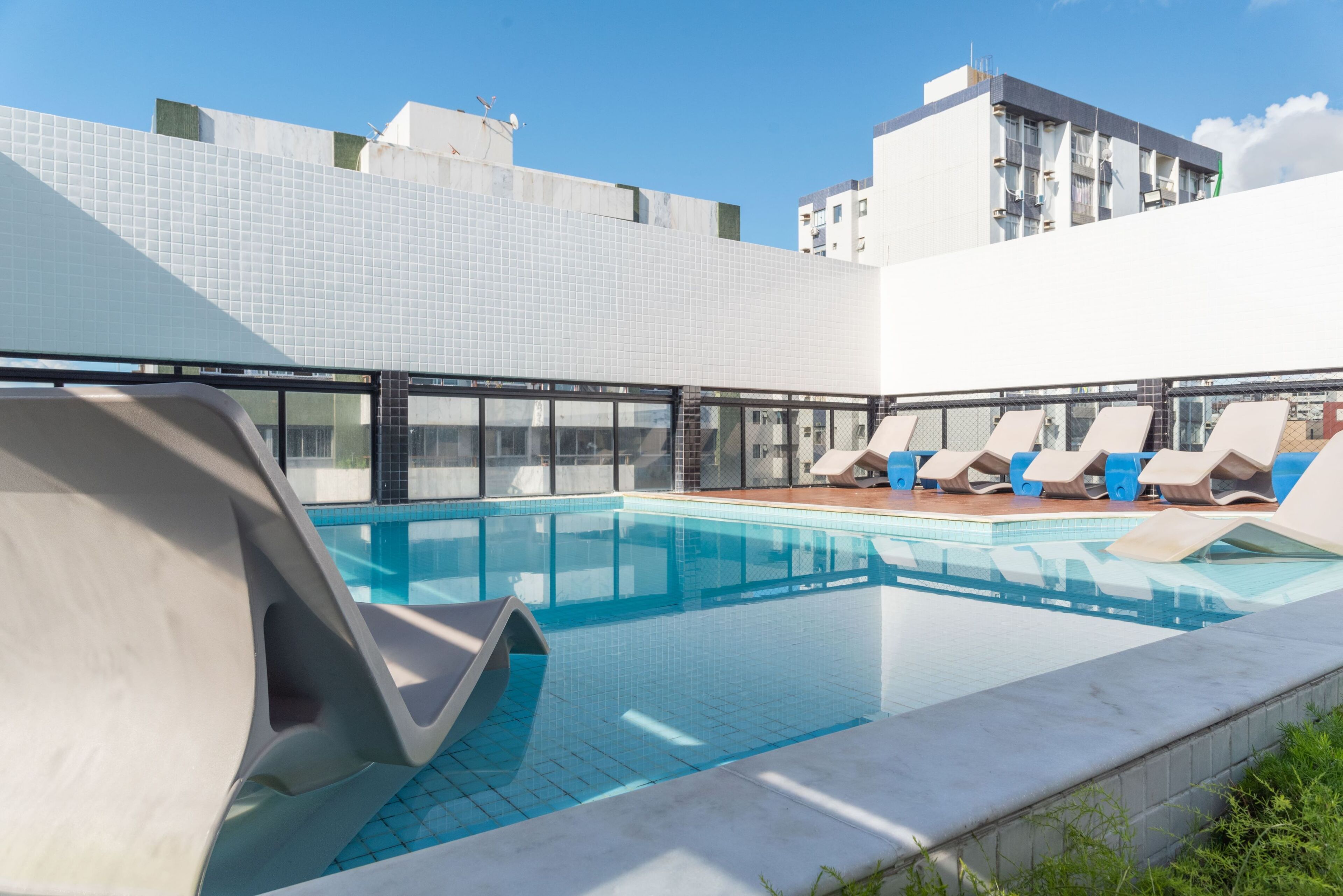 outdoor pool, pool umbrellas, pool loungers