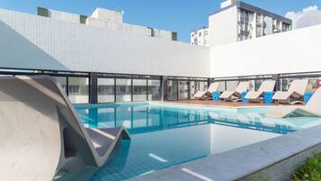 Outdoor pool, pool umbrellas, sun loungers