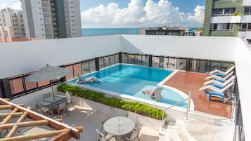 Outdoor pool, pool umbrellas, sun loungers