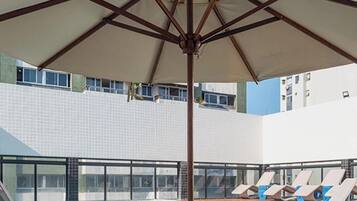 Outdoor pool, pool umbrellas, pool loungers