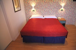 Premium bedding, memory-foam beds, in-room safe, individually decorated