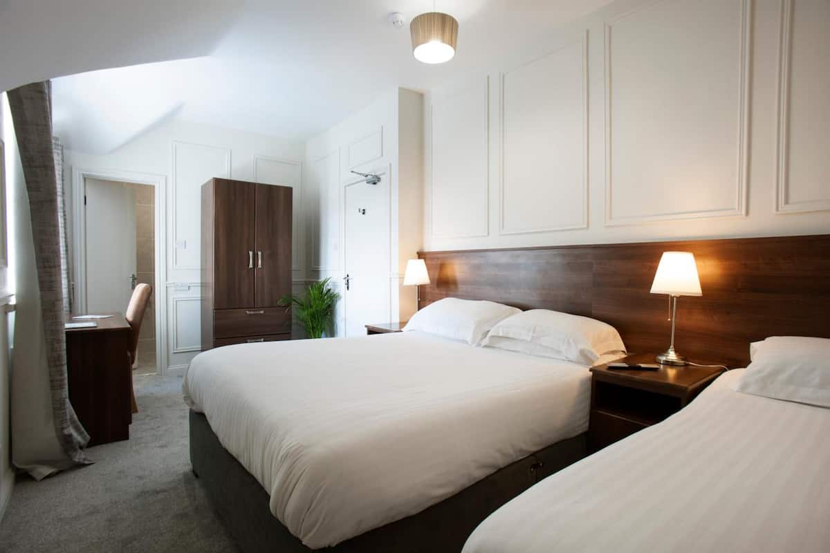 Premium Triple Room | Premium bedding, desk, laptop workspace, blackout drapes