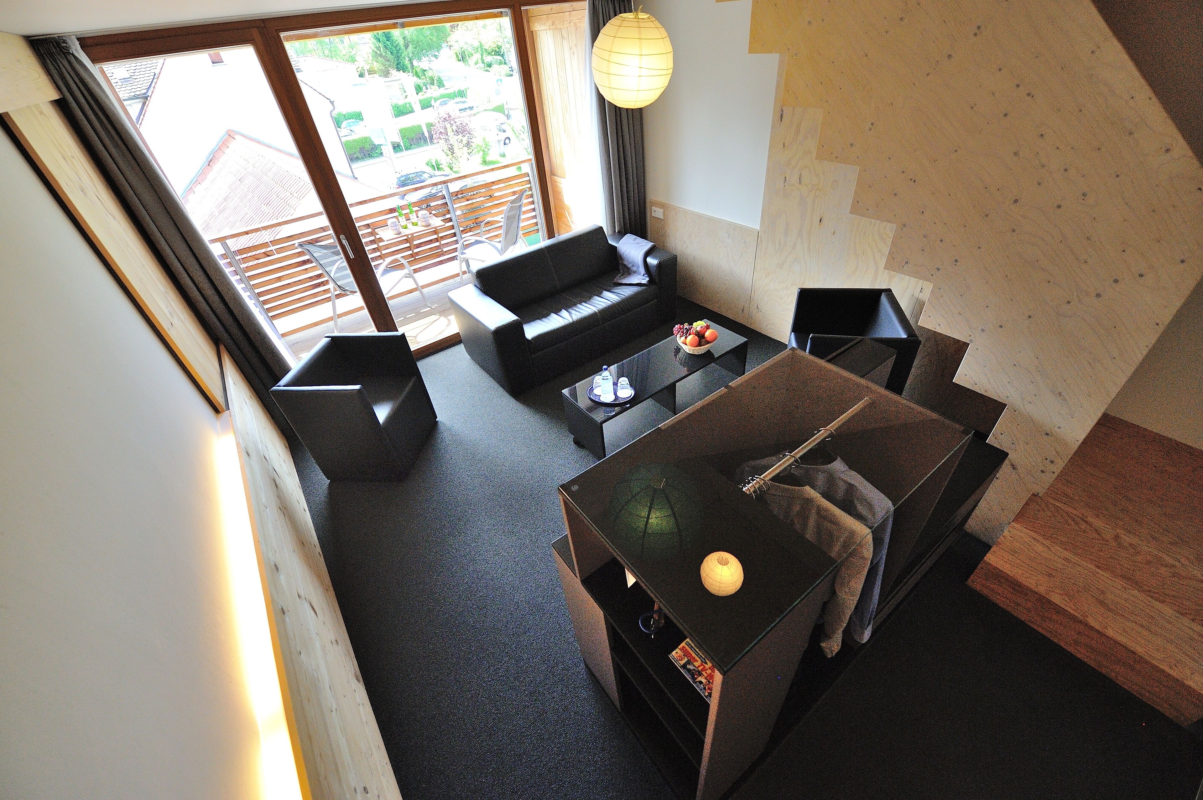 suite, 1 double bed, city view (biersuite-maisonette) | living area | 40-inch led tv with cable channels, tv, offices