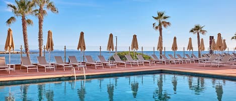 2 outdoor pools, pool umbrellas, sun loungers