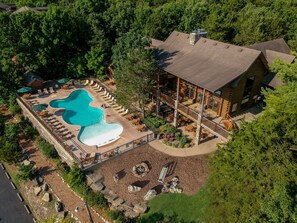 Indoor pool, outdoor pool, pool umbrellas - The Village At Indian Point Resort (Branson)