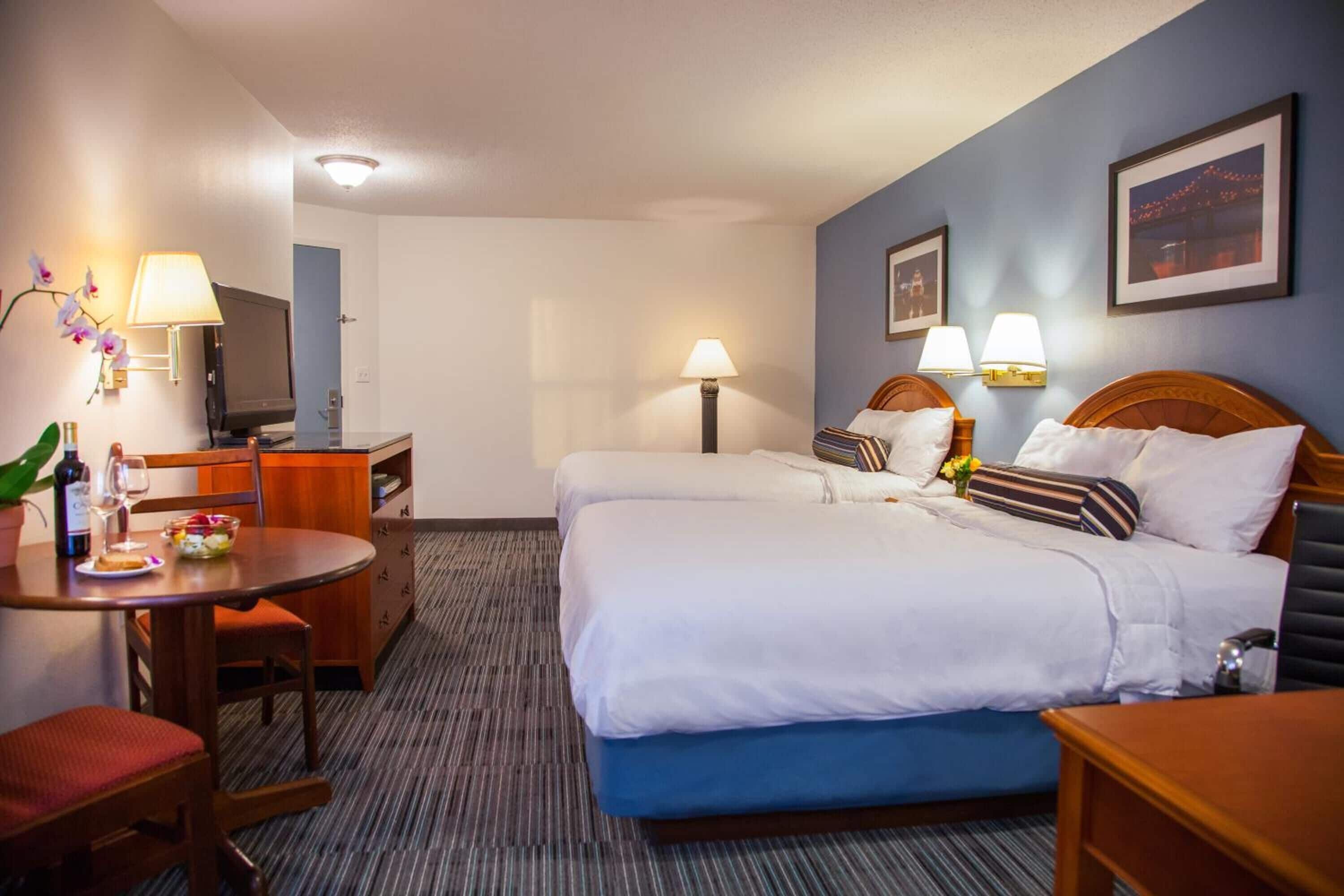 standard room, 2 queen beds, kitchenette | 1 bedroom, in-room safe, desk, blackout curtains