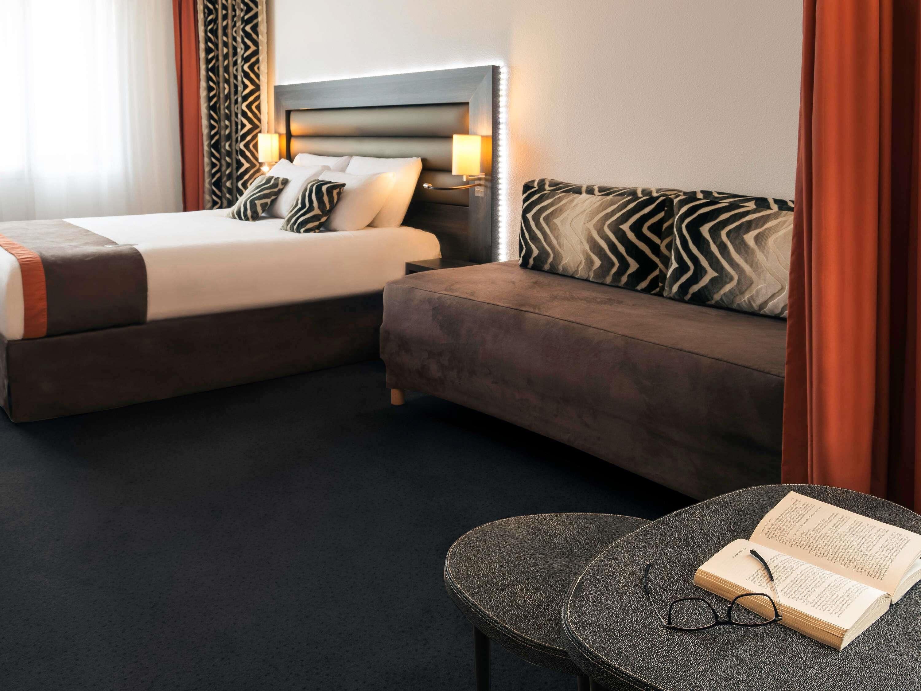 Suite Exécutive, 1 très grand lit et 1 canapé-lit | Coffres-forts dans les chambres, bureau, chambres insonorisées