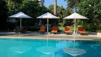 Outdoor pool, pool umbrellas, pool loungers