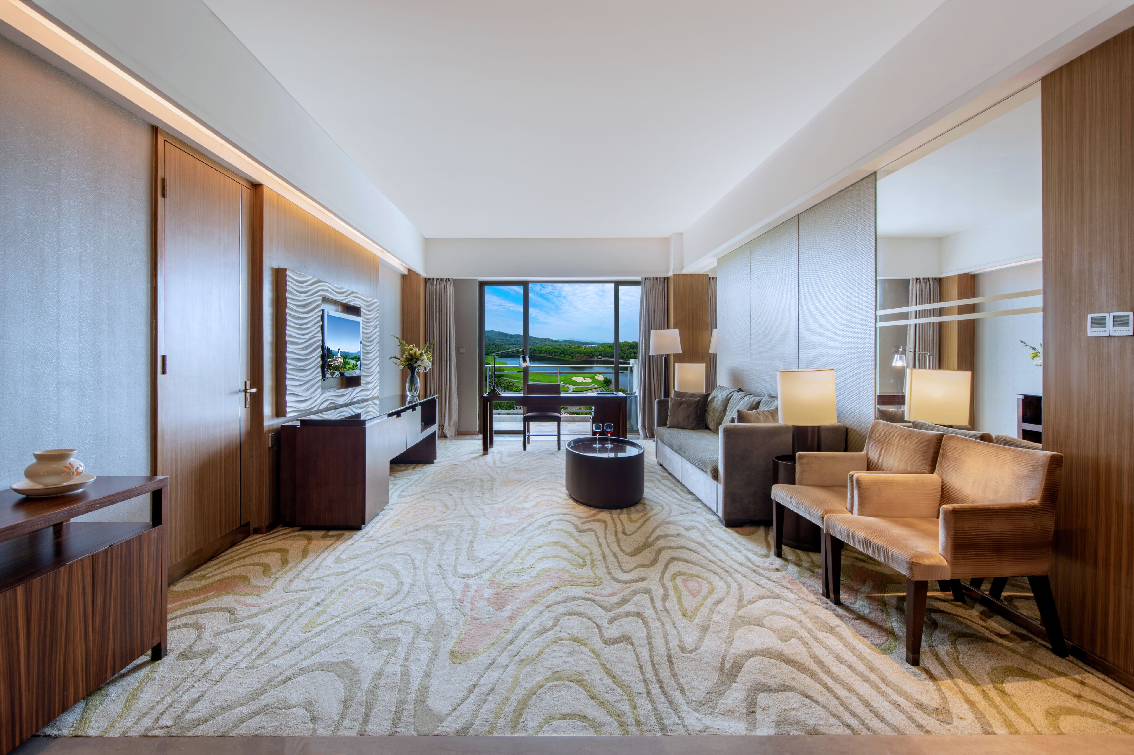 grande deluxe suite with lake view | 1 bedroom, in-room safe, desk, laptop workspace