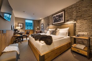 Select Comfort beds, free minibar, in-room safe, desk