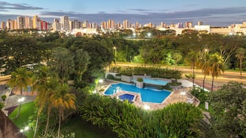 Outdoor pool, open 8:00 AM to 8:00 PM, pool umbrellas, pool loungers