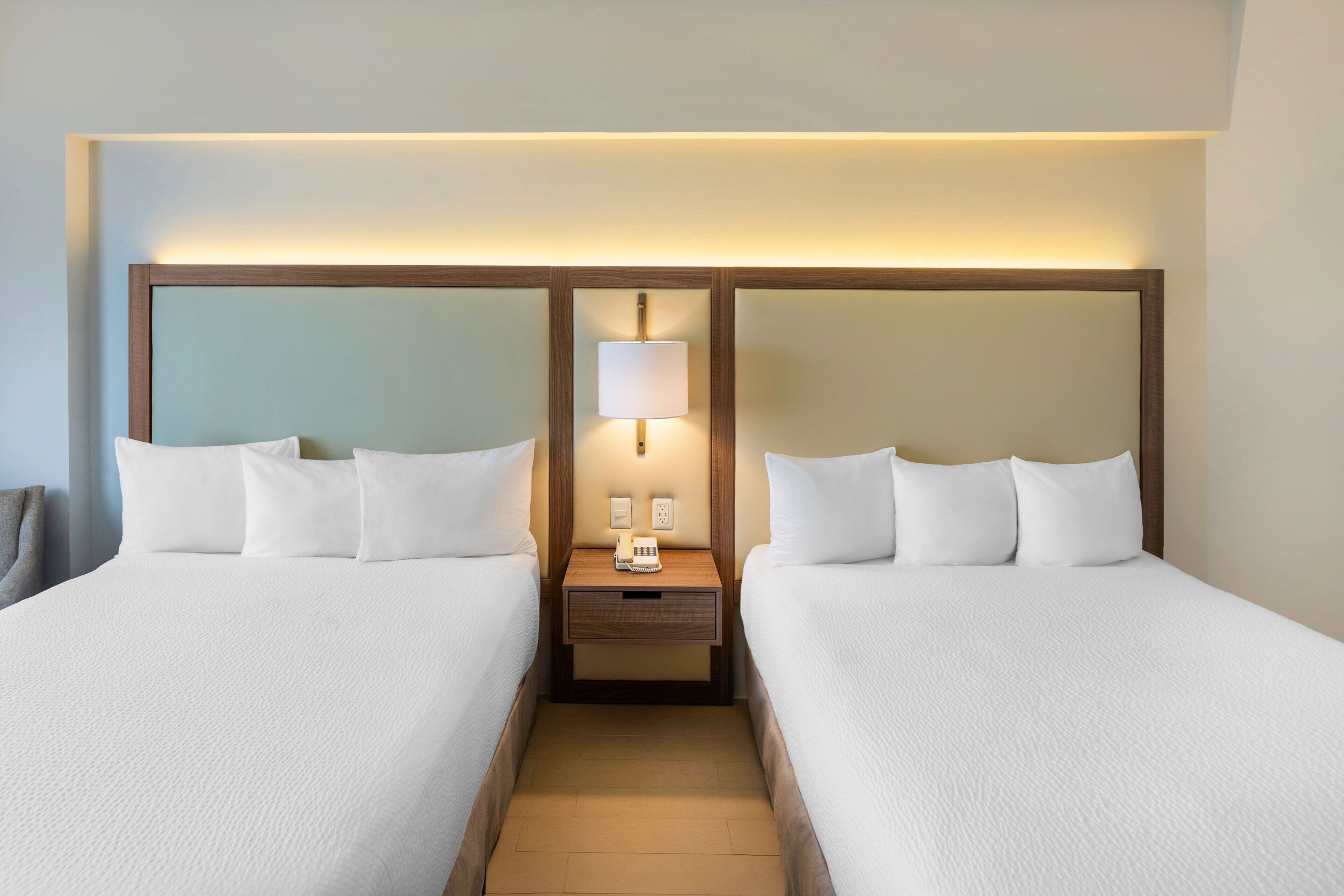 room, 2 double beds, non smoking | in-room safe, desk, laptop workspace, blackout curtains