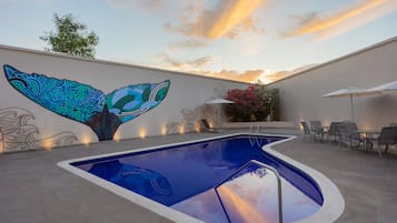 Outdoor pool, pool umbrellas, sun loungers