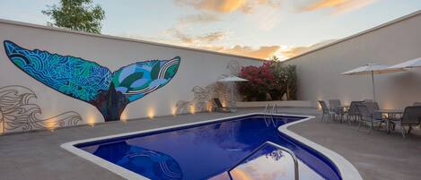 Outdoor pool, pool umbrellas, sun loungers