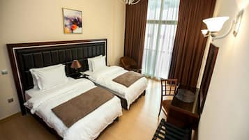 In-room safe, soundproofing, iron/ironing board, rollaway beds