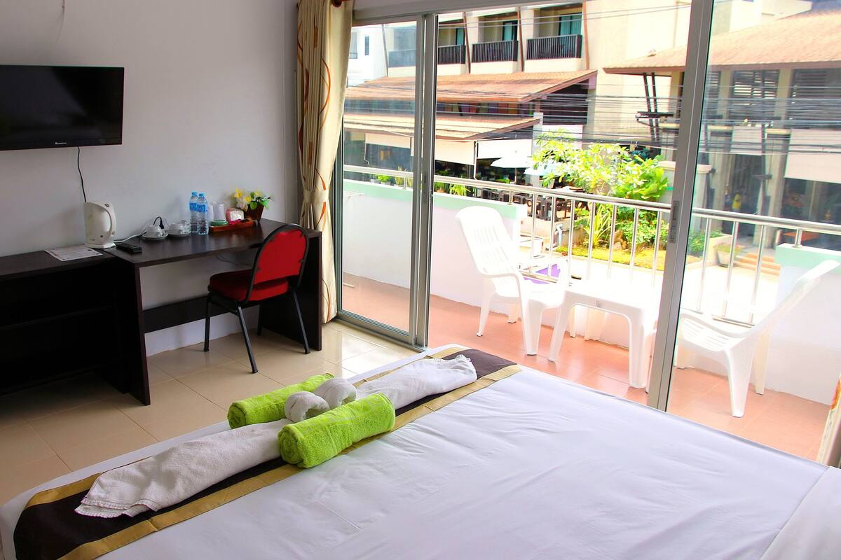 Standard Double Room | Living area | TV