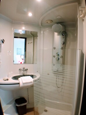 Shower, free toiletries, hair dryer, towels