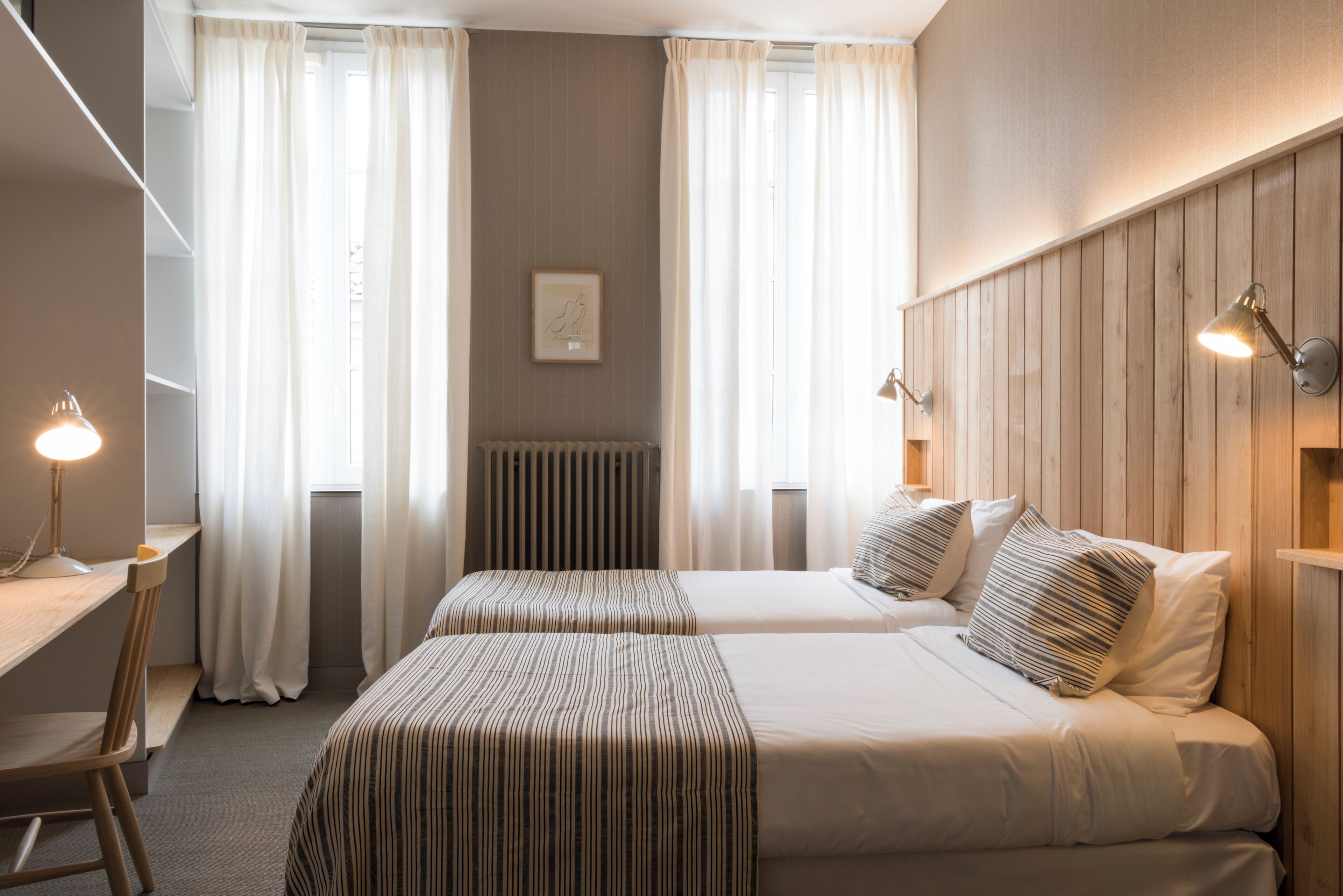 Desk, blackout curtains, soundproofing, cots/infant beds