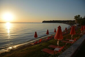 On the beach, sun loungers, beach umbrellas, beach towels - Al Mare Hotel (Zakynthos)