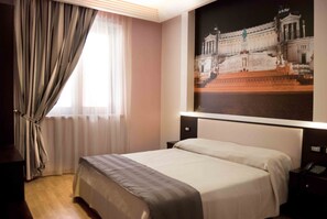 Premium bedding, pillow-top beds, minibar, in-room safe