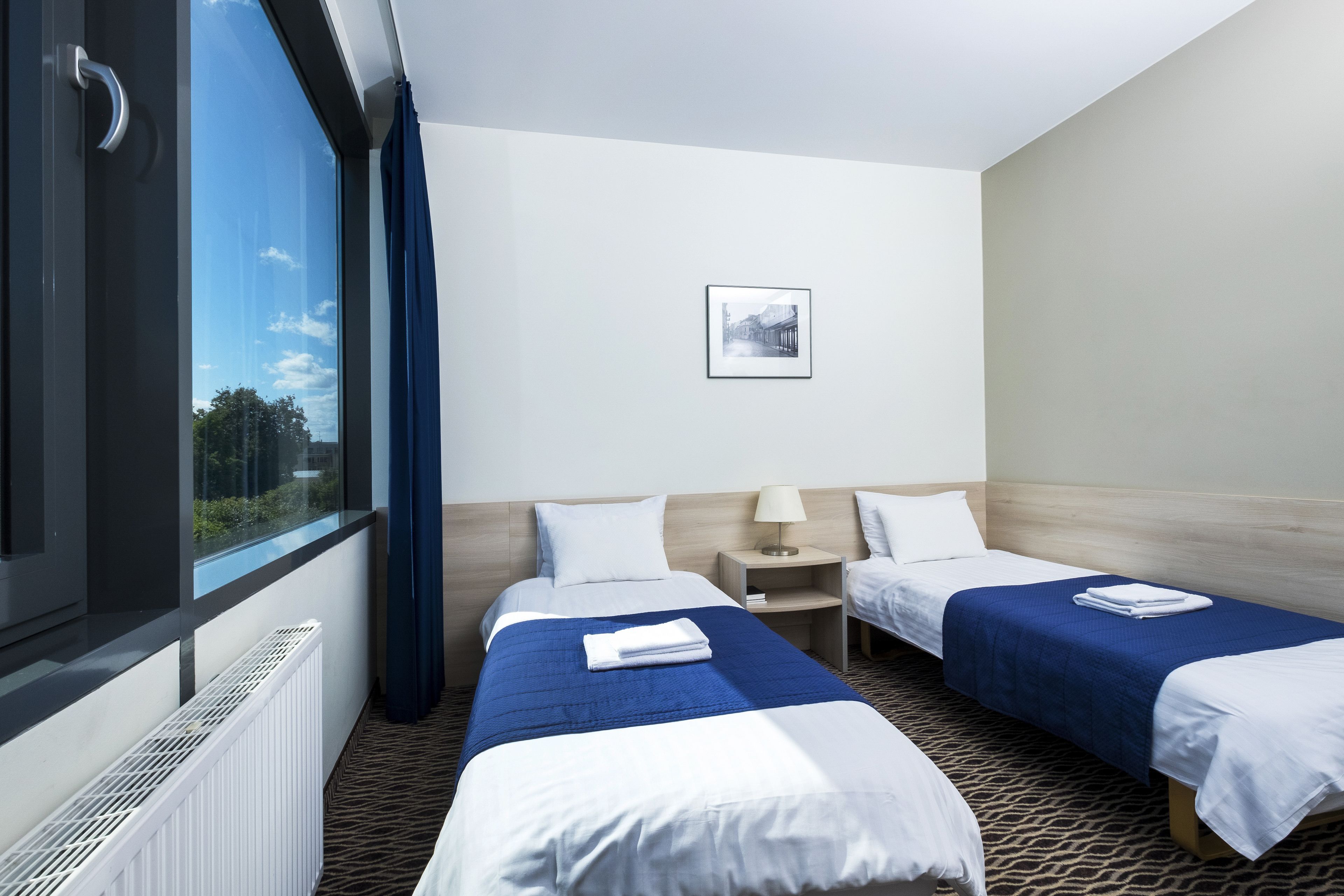 standard twin room, balcony | minibar, in-room safe, desk, blackout curtains