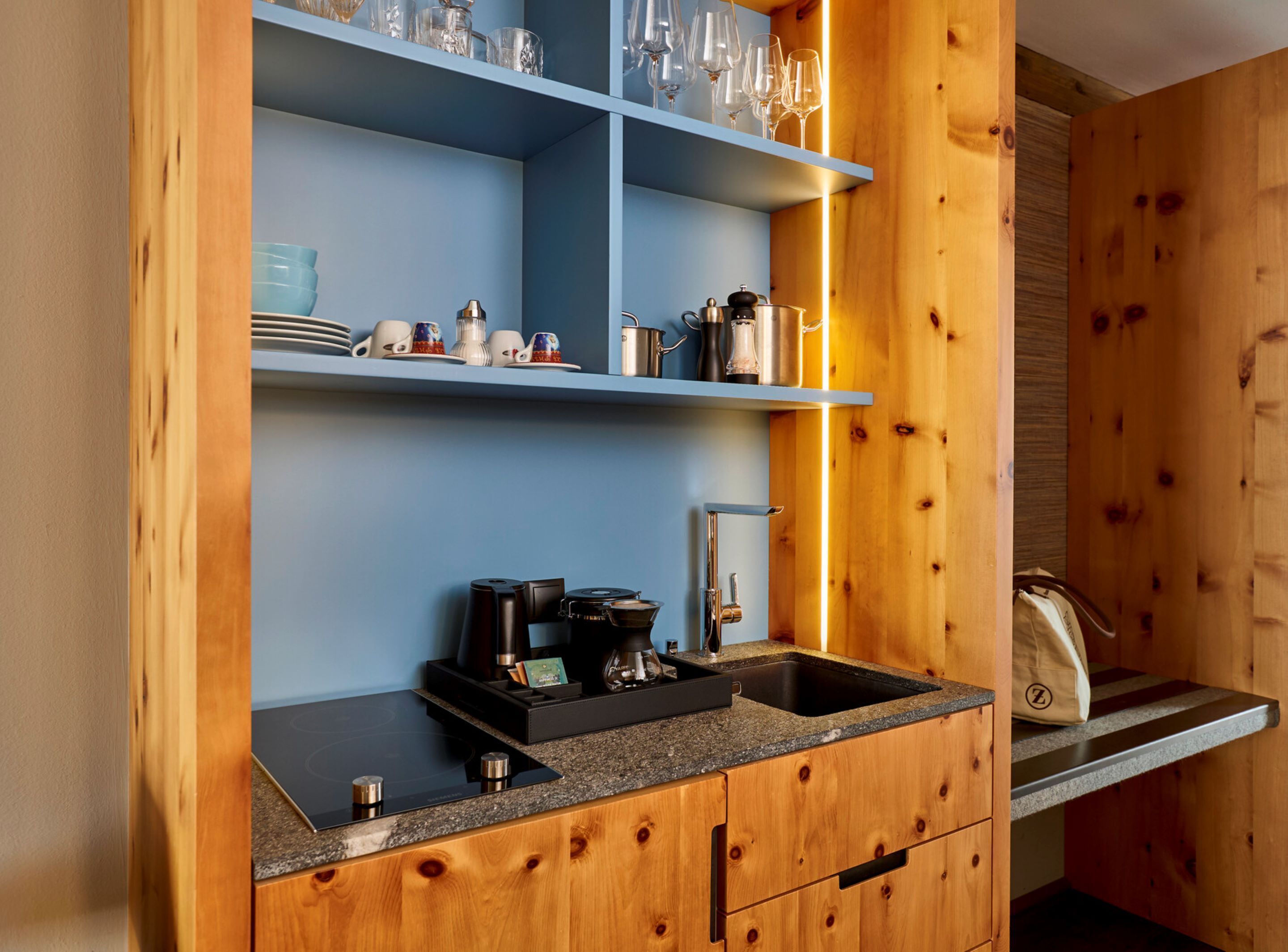 fridge, stovetop, electric kettle, high chair