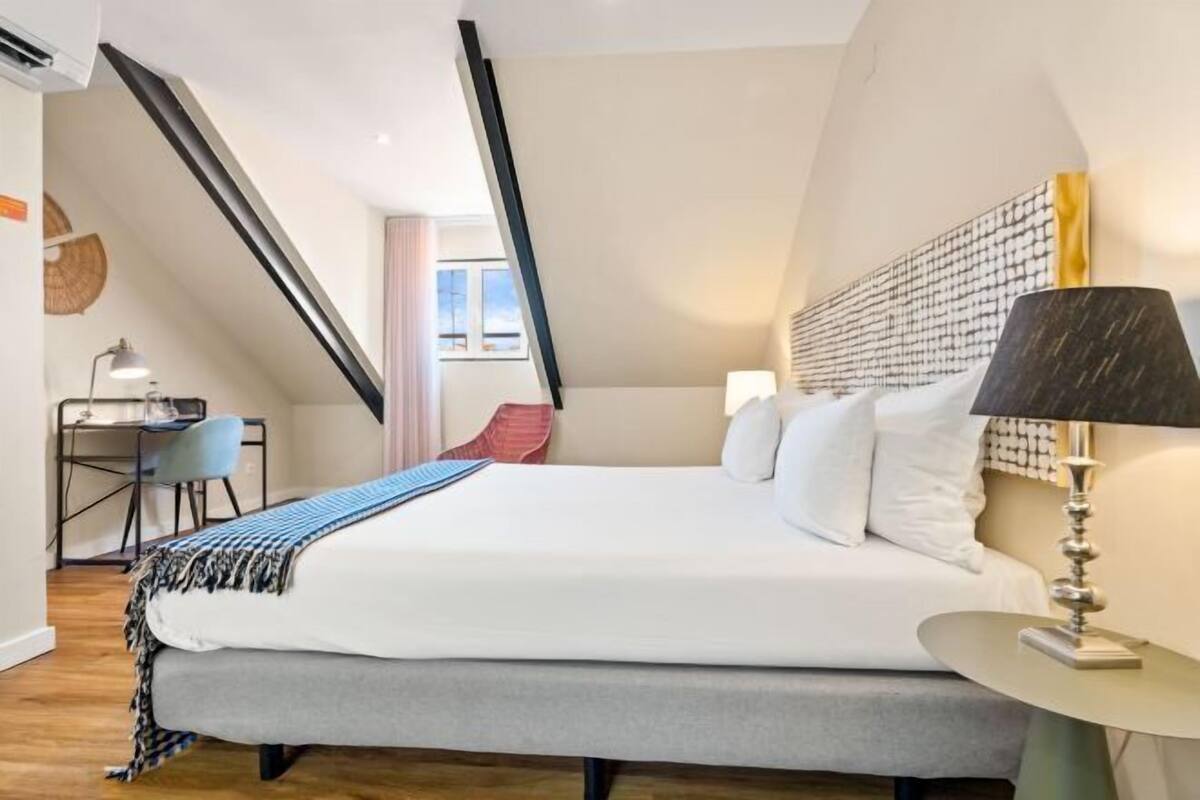 Literie hypoallergénique, minibar, coffres-forts dans les chambres