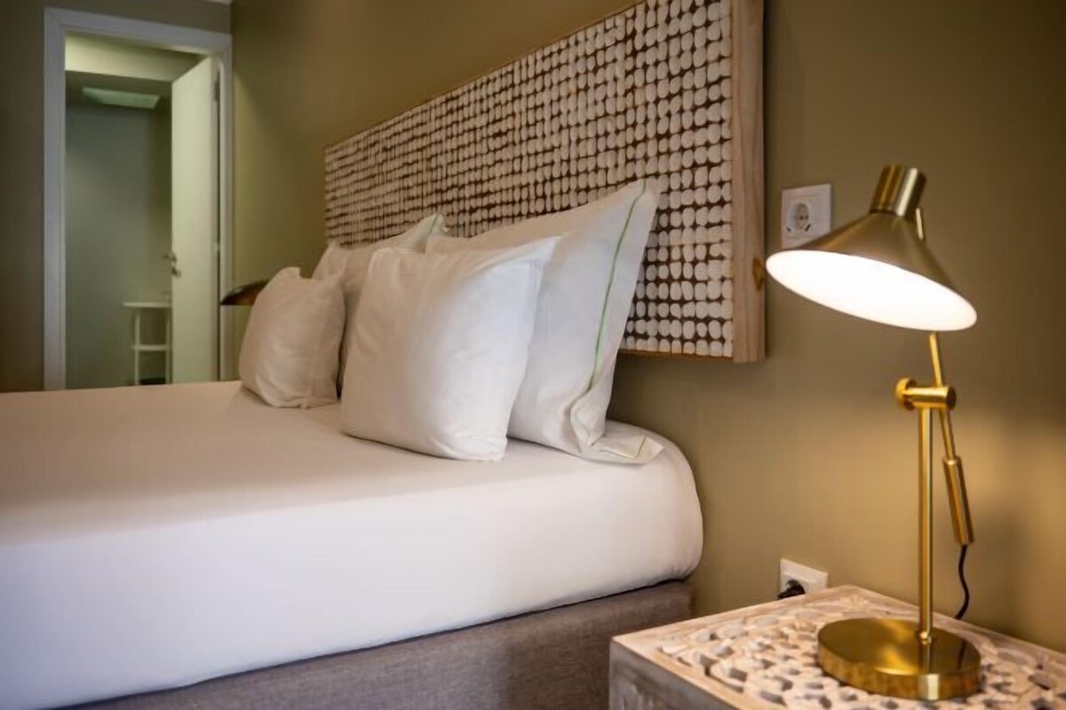 Literie hypoallergénique, minibar, coffres-forts dans les chambres