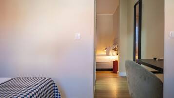 Family Quadruple Room | Hypo-allergenic bedding, minibar, in-room safe, individually furnished