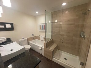 Economy Suite, 2 Bedrooms, Non Smoking (Upper Floor, No Pets Allowed) | Bathroom | Shower, hair dryer, towels, shampoo - Crystal Springs Lodge (Radium Hot Springs)