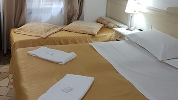 Triple Room, Shared Bathroom | Down comforters, desk, blackout drapes, soundproofing