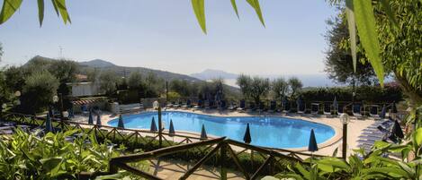 Outdoor pool, pool umbrellas, pool loungers