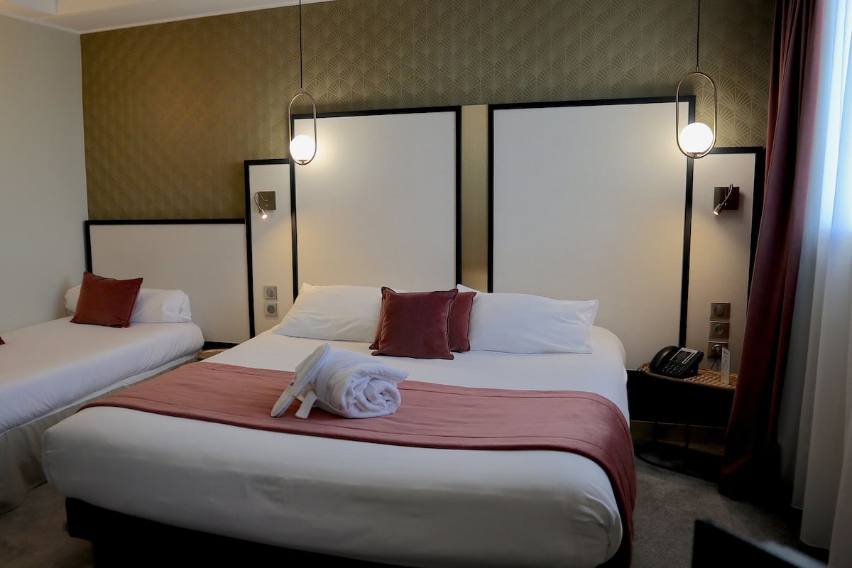 Executive Room, Multiple Beds, Non Smoking | Minibar, desk, soundproofing, free cots/infant beds