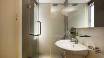 Shower, slippers, bidet, towels