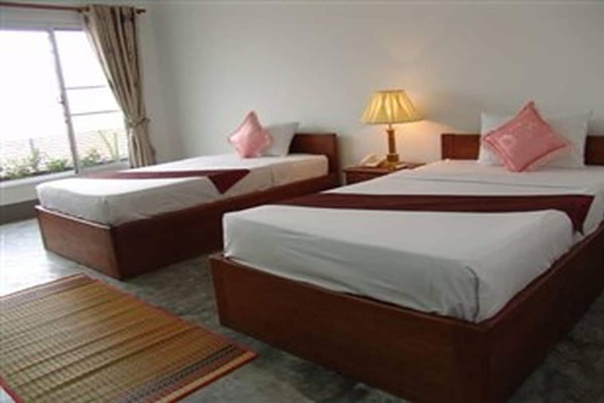 ห้องดีลักซ์ทวิน | เครื่องนอนระดับพรีเมียม, เตียงพร้อมฟูกเสริมที่นอน, มินิบาร์