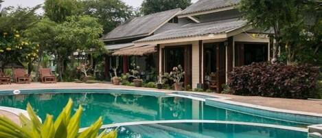 Outdoor pool, pool umbrellas, pool loungers