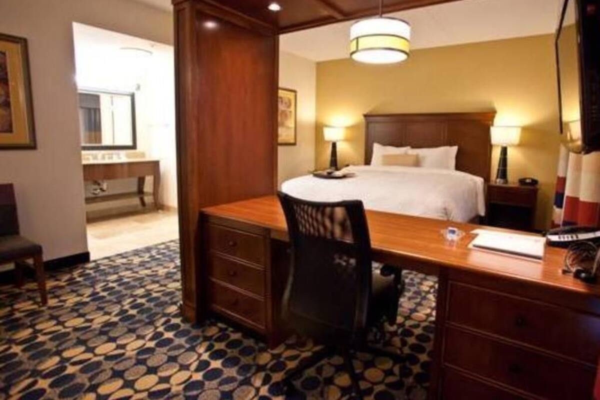 Premium bedding, desk, blackout drapes, iron/ironing board