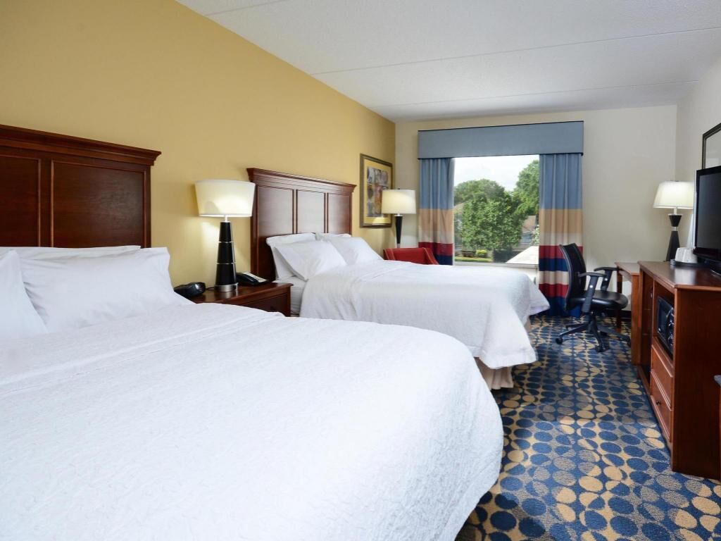 Premium bedding, desk, blackout drapes, iron/ironing board