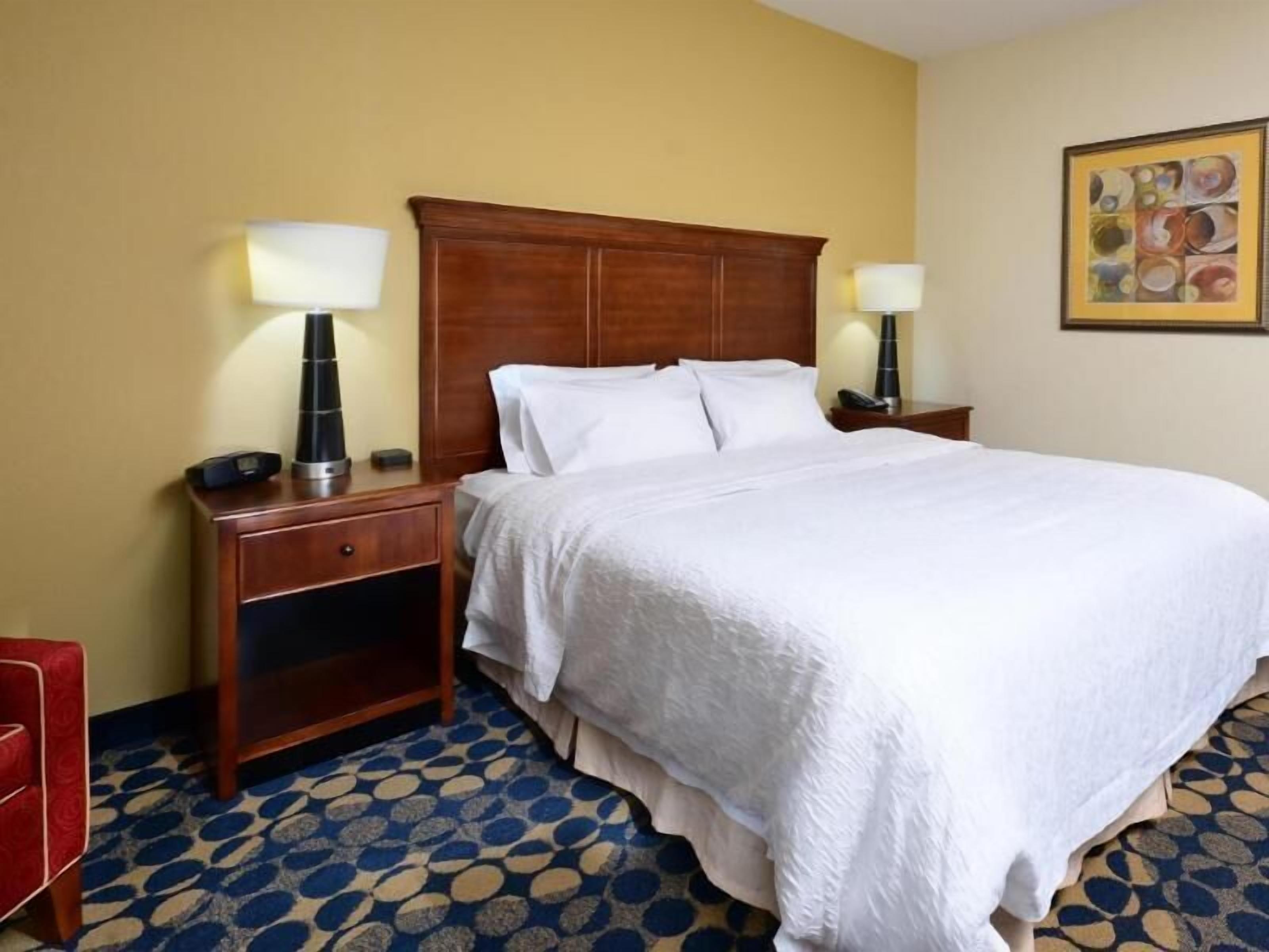 Premium bedding, desk, blackout drapes, iron/ironing board