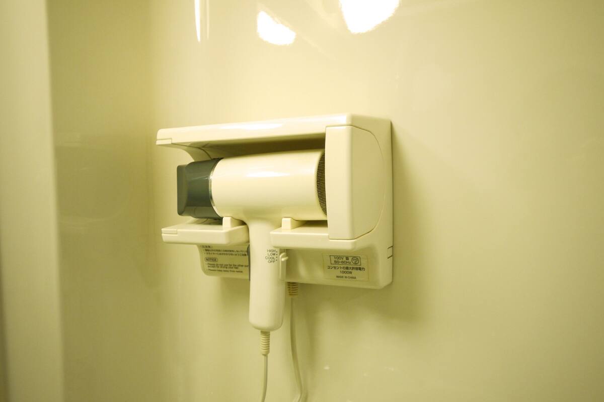 free toiletries, hair dryer, slippers, towels