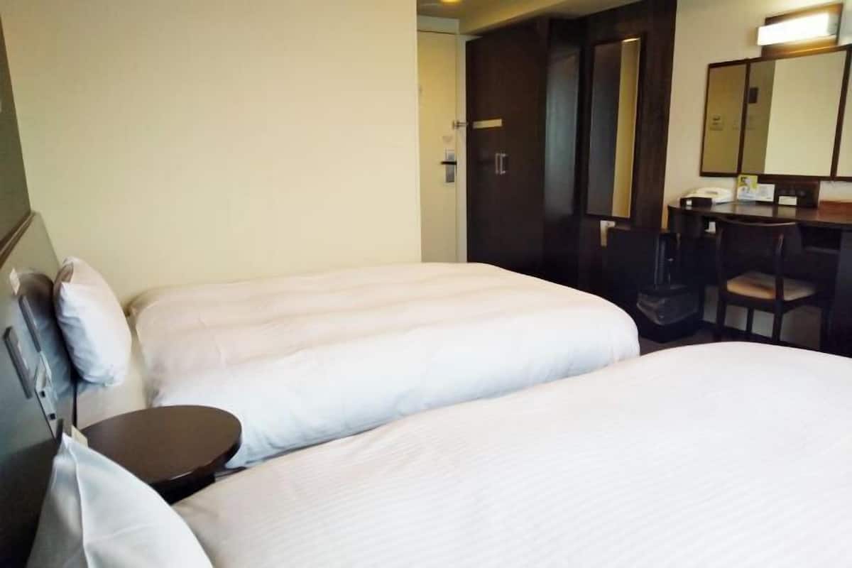 Desk, free WiFi, bed sheets