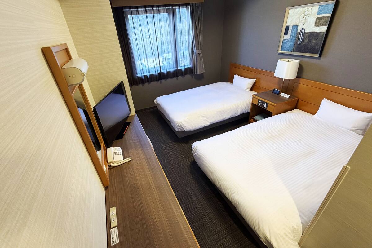Desk, WiFi (free), bed sheets
